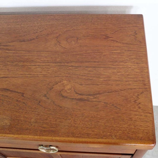 Vintage teak mid-century British sideboard top with rich wood grain and smooth finish.