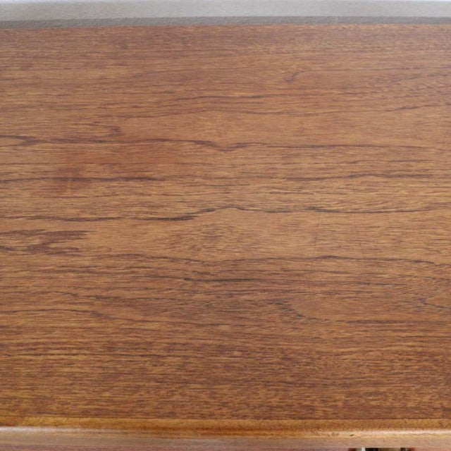 Mid-century British vintage teak sideboard top showing rich wood grain and smooth finish.