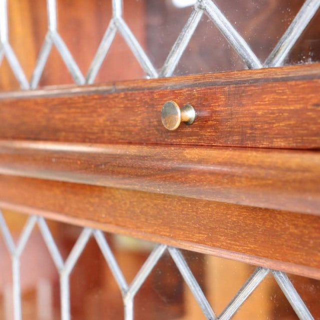 Vintage teak Globe Wernicke glass bookcase door with diamond-patterned leaded glass and brass knob, mid-century British.
