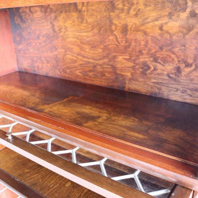 Vintage mid-century teak Globe Wernicke glass bookcase with rich wood grain and polished finish.