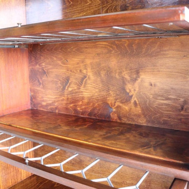 Vintage teak Globe Wernicke glass bookcase interior with rich wood grain and mid-century British design.
