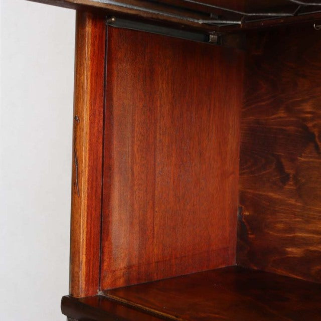 Vintage teak Globe Wernicke glass bookcase panel with rich wood grain and mid-century British design details.