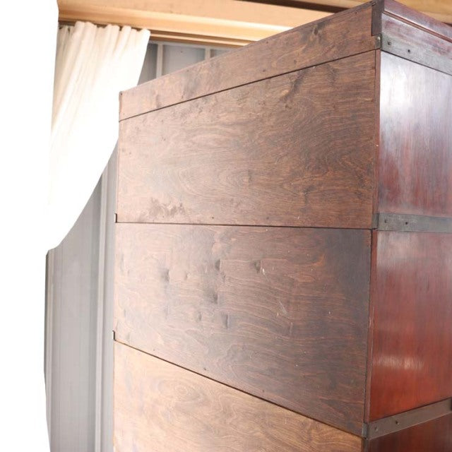 Vintage mid-century teak Globe Wernicke glass bookcase with rich wood grain and clean British-Denmark design lines.