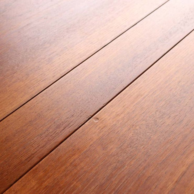 Mid-century vintage teak dining table surface with rich wood grain and smooth finish from British-Denmark design.