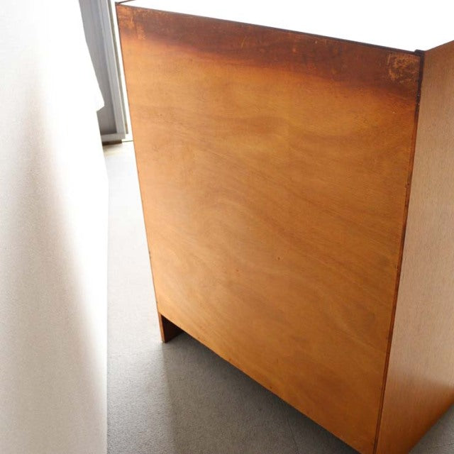 Vintage teak G-Plan mid-century chest side view with smooth wood grain and clean lines.