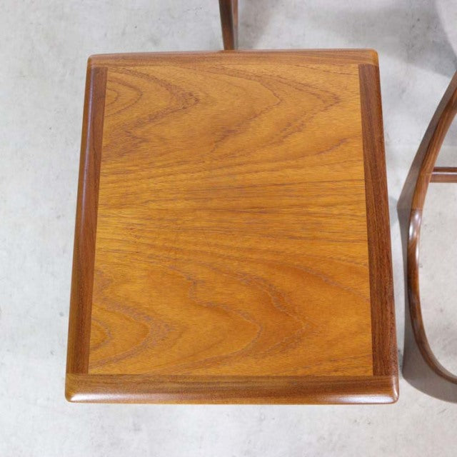 Vintage G-Plan teak nest table with rich wood grain, rounded edges, and mid-century British design.
