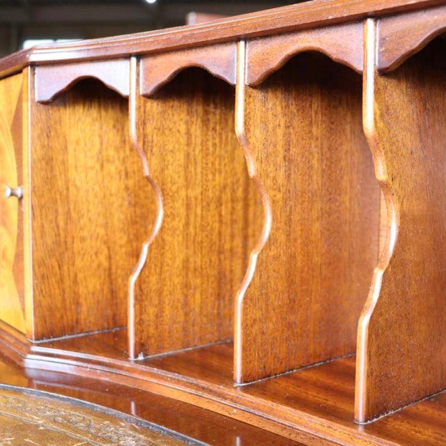 Vintage teak British mid-century desk organizer with curved dividers and rich wood grain.