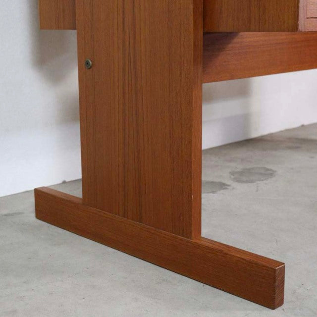 Mid-century vintage teak desk leg from Denmark with smooth wood grain and sturdy rectangular base.