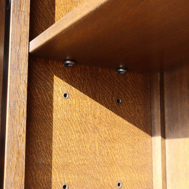 Close-up of vintage teak wood grain inside British mid-century Jaycee cabinet shelf with warm tones and smooth finish.