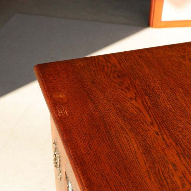 Vintage mid-century teak cabinet corner by British Jaycee with rich wood grain and warm finish.