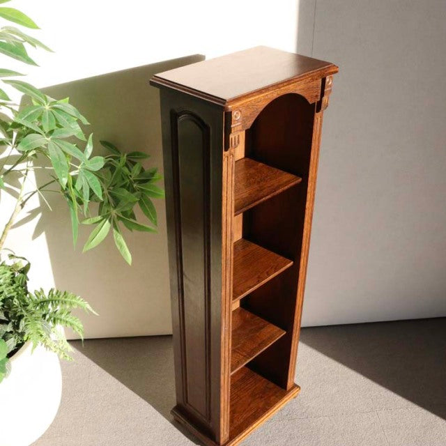 Vintage mid-century teak cabinet with British design, tall slim form, rich wood grain, and three open shelves.
