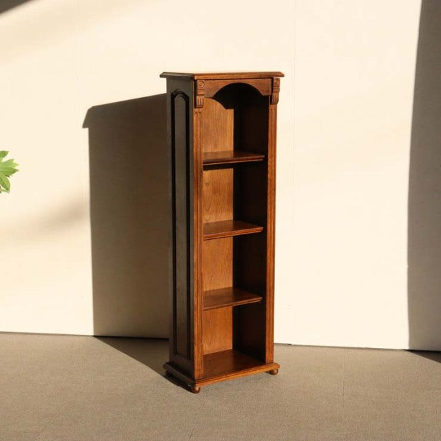 Vintage teak mid-century British cabinet with open shelves, rich wood grain, and slender legs.