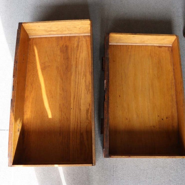 Open top view of a vintage teak cabinet drawer showing smooth wood grain and clean mid-century British design with Danish.