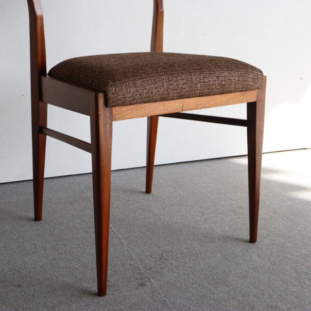 Vintage mid-century McIntosh teak dining chair with tapered legs and textured brown upholstered seat, British design with.