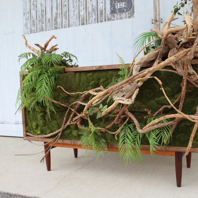 Vintage teak G-Plan sideboard with mid-century British design, green banyan upholstery, slender tapered legs, rich wood.
