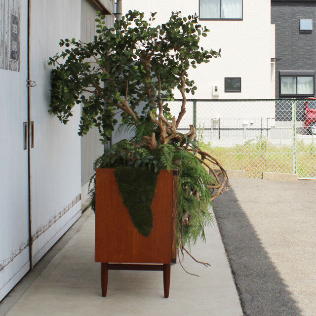Vintage teak G-Plan sideboard with rich wood grain, tapered legs, and mid-century British-Denmark design.