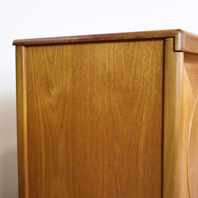 Vintage mid-century teak sideboard by British brand Nathan, showcasing smooth wood grain and clean lines.