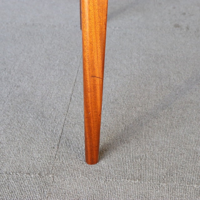 Mid-century teak dining chair leg with smooth grain and tapered British design from McIntosh, Denmark style.