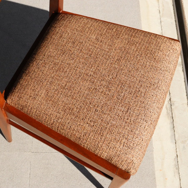 Vintage teak dining chair seat with textured fabric upholstery, British mid-century design, clean wooden frame and visible.