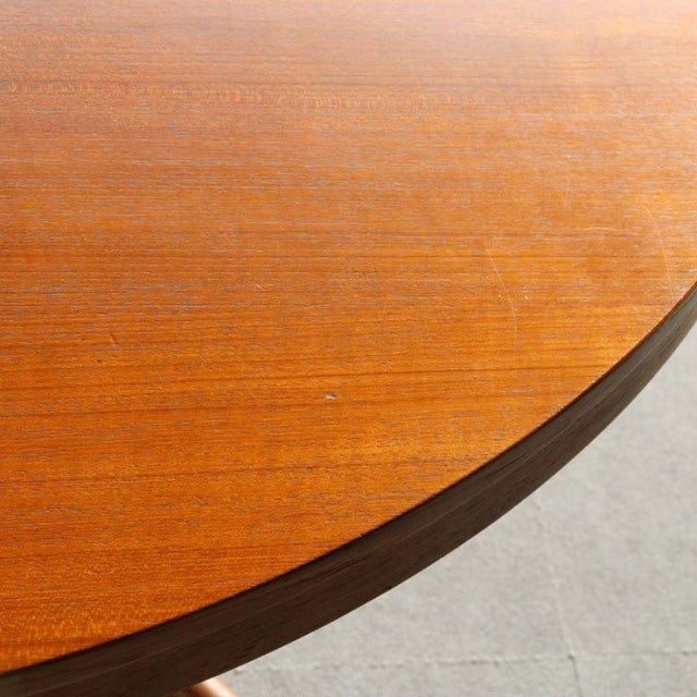 Round vintage teak dining table top by Edward Valentinsen, showcasing rich wood grain and smooth mid-century British-Danish.