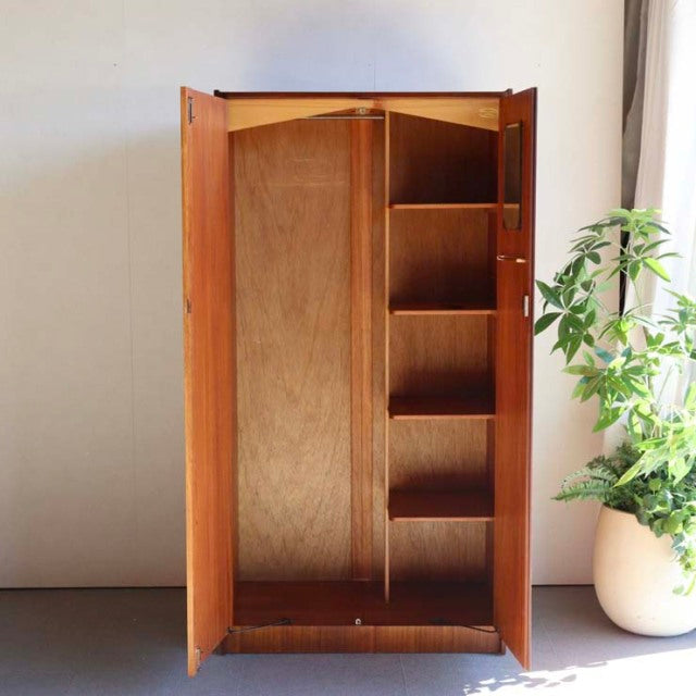 Mid-century British vintage teak wardrobe by William Laurence with clean lines, four interior shelves, and tapered legs.