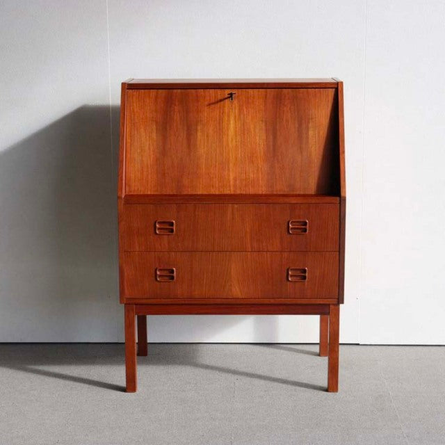 Vintage mid-century teak bureau by Gunnar Nielsen Tibergaard, Danish design with clean lines, rich wood grain, and.