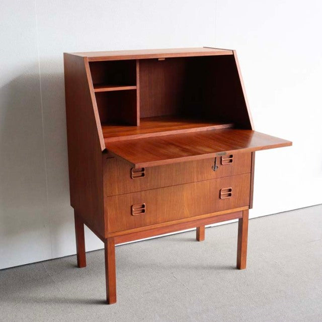 Mid-century vintage teak bureau by Gunnar Nielsen Tibergaard, Danish design with clean wood grain, tapered legs, and.