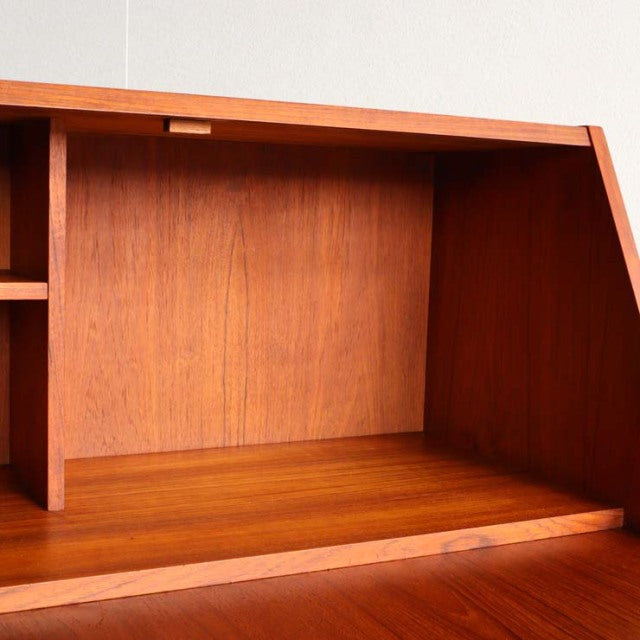 Mid-century vintage teak bureau from Denmark by Gunnar Nielsen Tibergaard with smooth wood grain and clean lines.