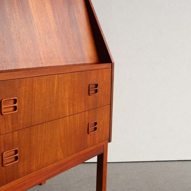 Vintage mid-century teak bureau by Gunnar Nielsen Tibergaard, Danish design with smooth wood grain, tapered legs, and.