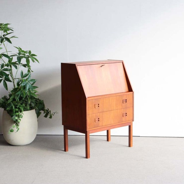 Mid-century Danish vintage teak bureau by Gunnar Nielsen Tibergaard with clean lines, tapered legs, and drop-front desk.