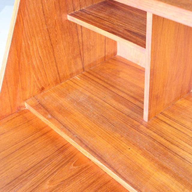 Close-up of vintage Danish teak bureau showing rich wood grain and smooth mid-century craftsmanship by Gunnar Nielsen.