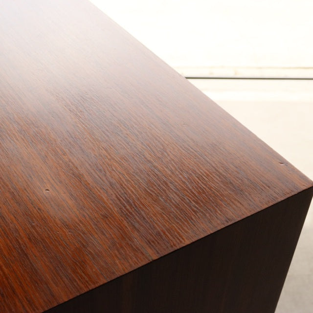 Vintage mid-century teak five-drawer chest by MEREDEW with rich wood grain and clean British design lines.