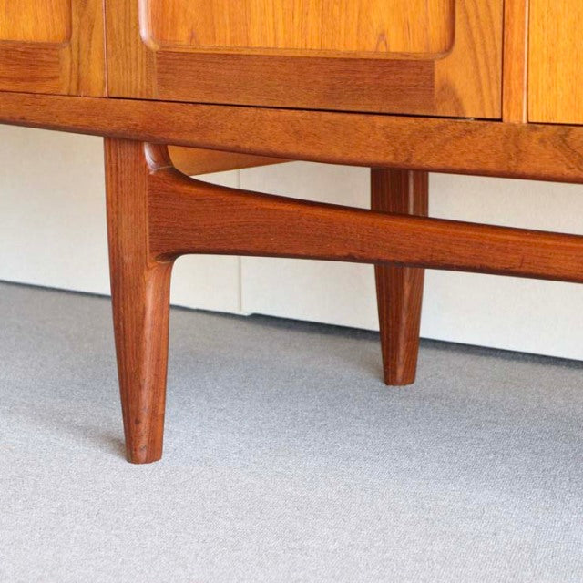 Mid-century British vintage teak sideboard leg with sleek tapered design and smooth wood grain, G-Plan Fresco model from.