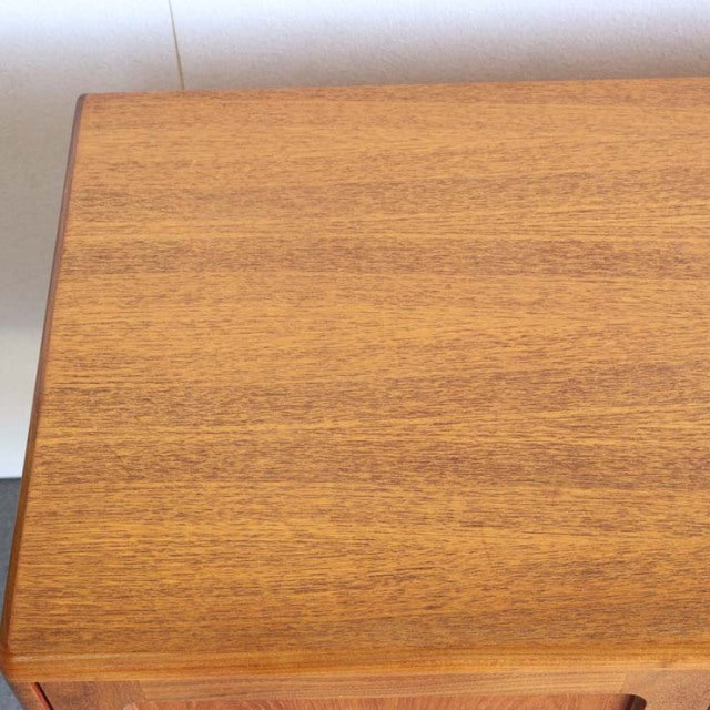 British mid-century G-Plan Fresco teak sideboard top corner with warm wood grain and smooth finish.