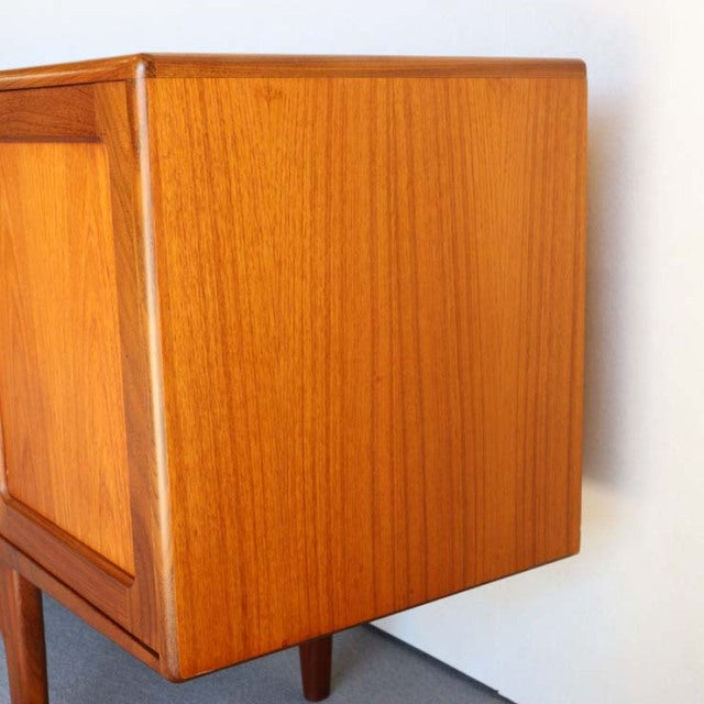 Mid-century British vintage teak sideboard by G-PLAN with smooth wood grain and tapered legs, Danish-inspired design.