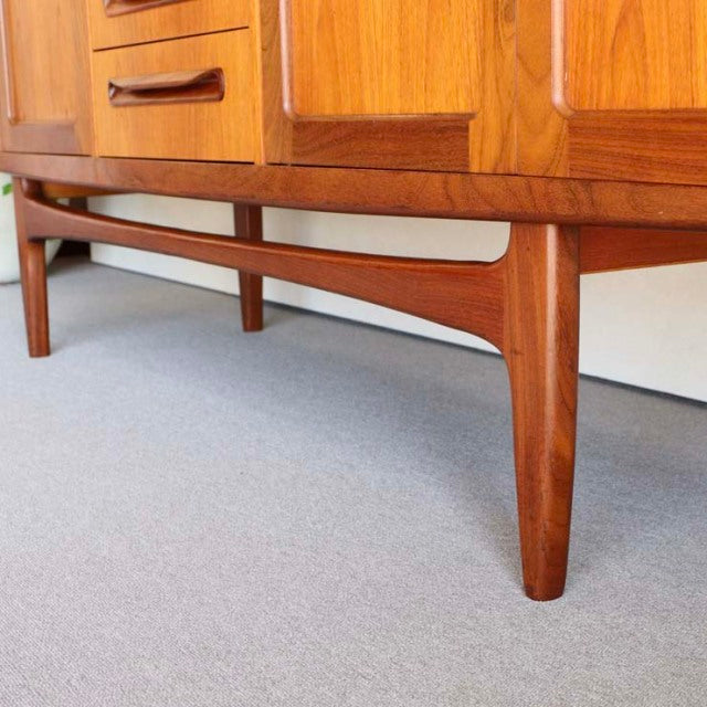 Vintage teak G-PLAN mid-century sideboard base with tapered legs and Danish-inspired form.