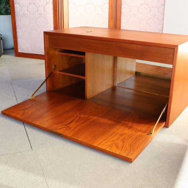 Mid-century vintage teak cabinet by Preben Sørensen for Randers Møbelfabrik, Danish design, rich wood grain, drop-down door.