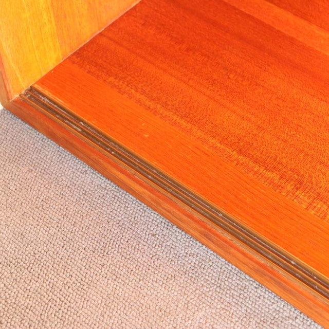 Close-up of vintage mid-century teak wood grain and joinery on PS system cabinet base by Preben Sørensen for Randers.