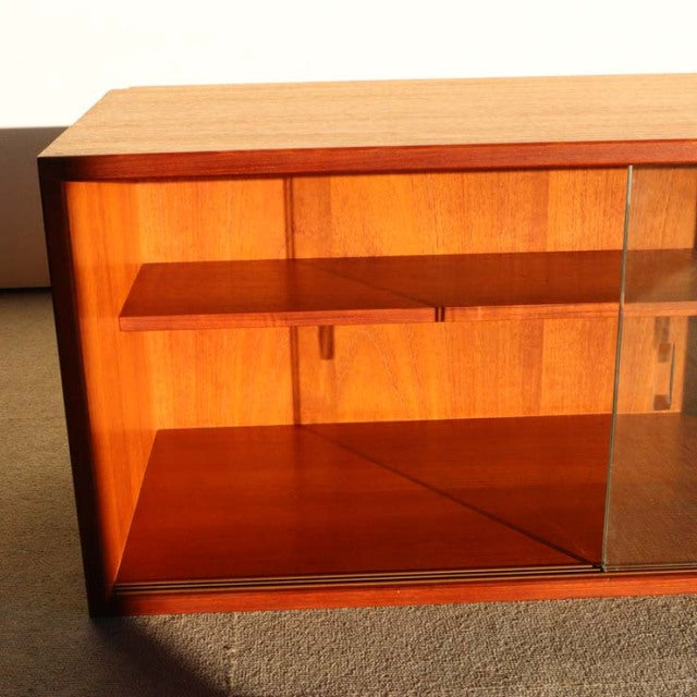 Vintage teak mid-century cabinet by PS System Preben Sørensen for Randers Møbelfabrik, Denmark, with clear glass sliding.