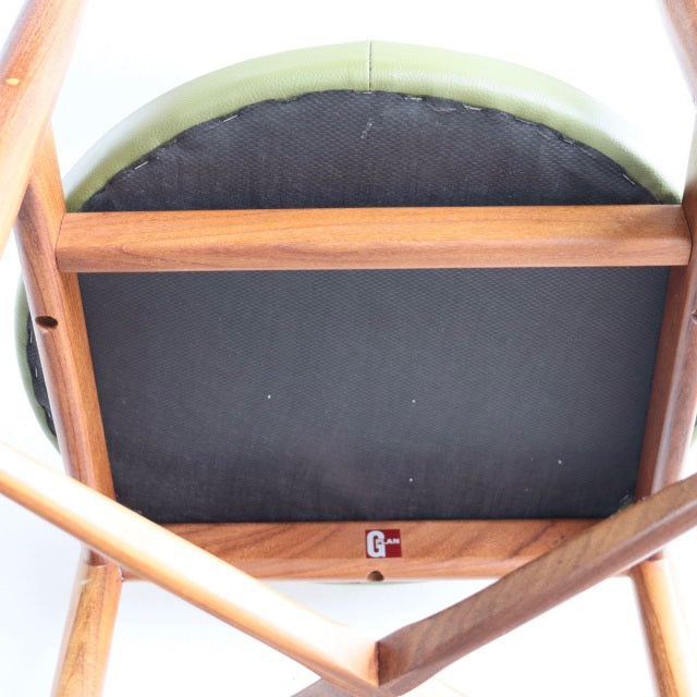 Vintage teak dining chair underside showing sturdy British mid-century G-PLAN frame with visible wood grain and cross.
