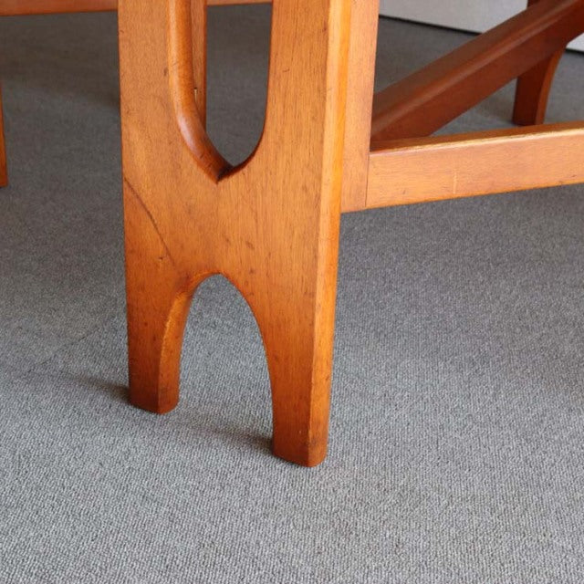 Mid-century British vintage teak drop-leaf table leg with warm wood grain and sculpted cutout design from Jentique.