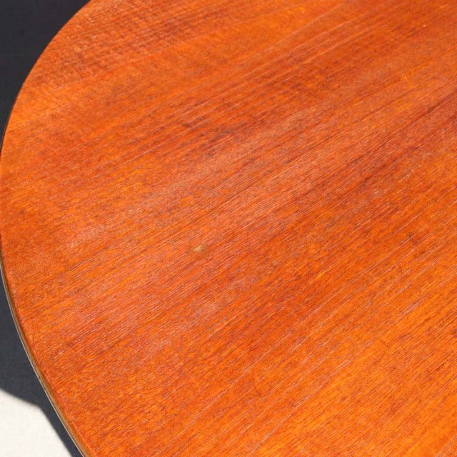 Vintage teak drop-leaf dining table by JENTIQUE with smooth wood grain, British mid-century design from Denmark.