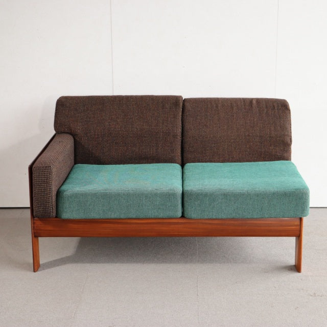Vintage mid-century teak two-seater sofa with British Harris Tweed upholstery, turquoise seat cushions, and dark brown.