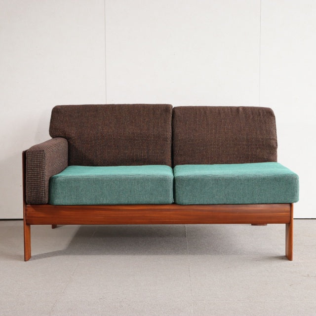 Vintage mid-century teak two-seater sofa with British Harris Tweed fabric, teal seat cushions and brown backrest, clean.