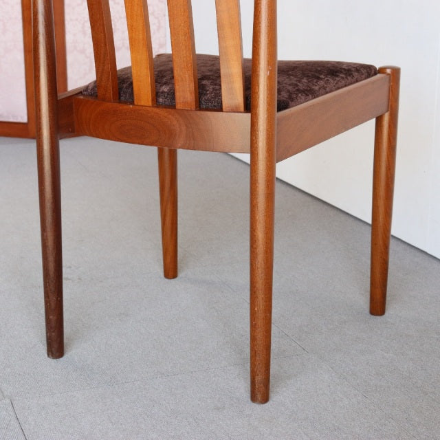 Vintage Meredew teak dining chair with mid-century British design, clean lines, and vertical slatted back.