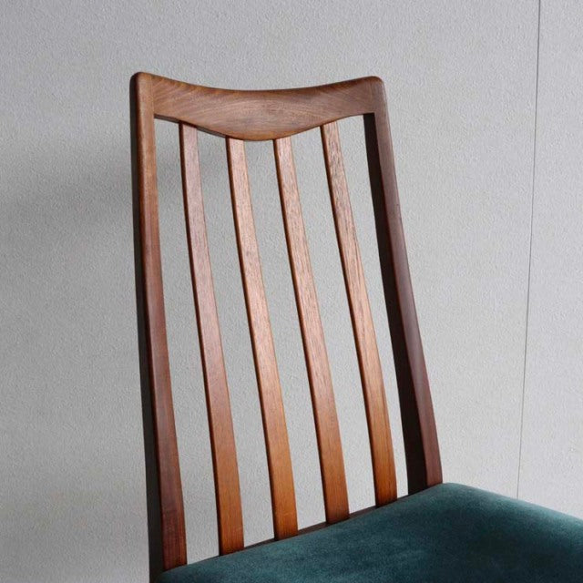 Vintage G-Plan teak dining chair with slatted back and curved top rail, mid-century British design, upholstered teal seat.