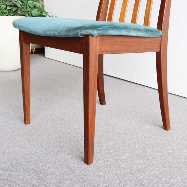 Mid-century British G-PLAN dining chair with vintage teak frame, curved backrest, and teal upholstered seat cushion.