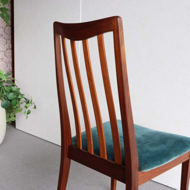 British vintage mid-century teak G-Plan dining chair with curved slatted back and teal upholstered seat.