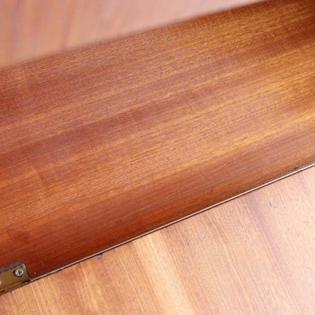 Vintage teak Macintosh cabinet drawer showcasing rich wood grain and mid-century British craftsmanship from Denmark.
