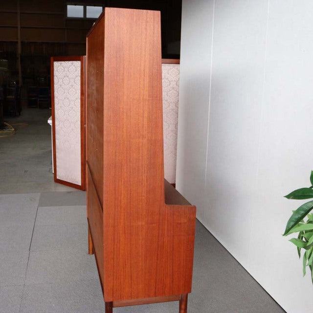 Mid-century British vintage teak cabinet by A.H. McIntosh with clean lines and visible wood grain.
